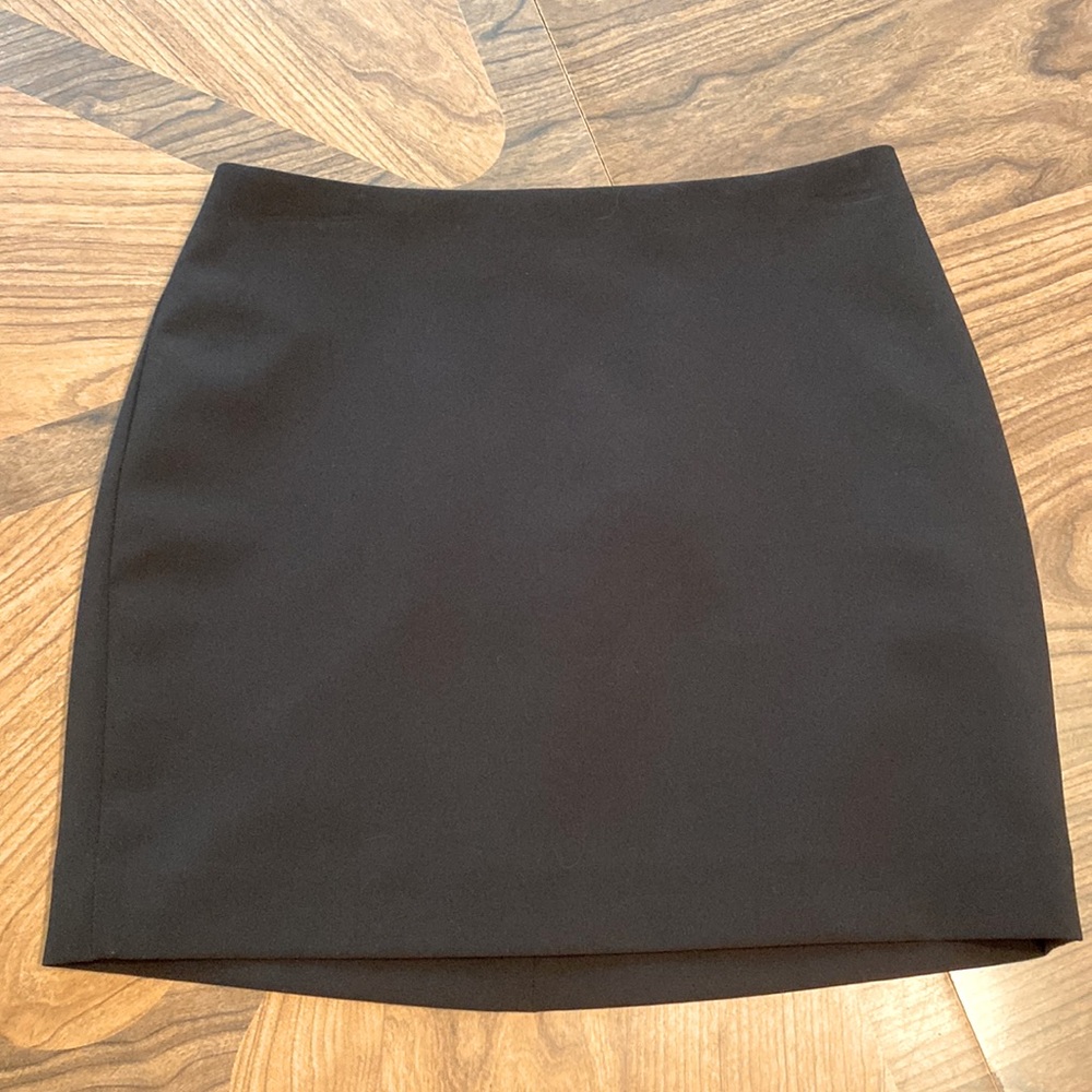 High rise black skirt.